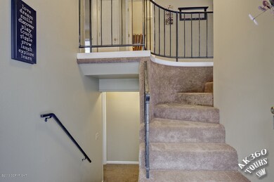Entry With Curved Staircase