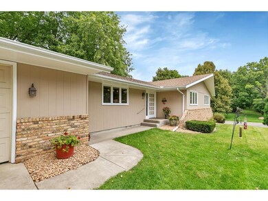 Wood siding with brick accents on front of home pl