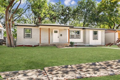Single story home featuring a front yard