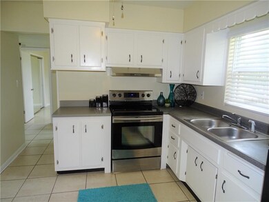 Kitchen with Newer Range & Refrigerator