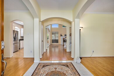 Inviting front entry with high ceilings, crown mol