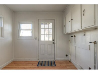 Laundry/mud room. Door goes to back covered patio 