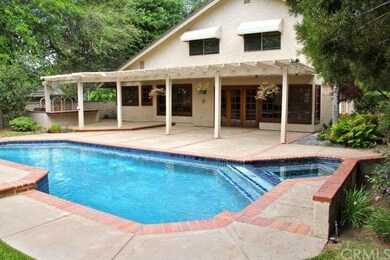 Entertainer's backyard with pool and spa, plus bui