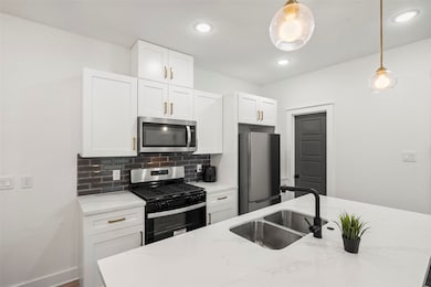 Ample storage in the kitchen keeps everything neat