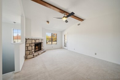 Large window for natural light and door to private