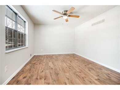 The living room is 14 x 11 with new paint, new lam