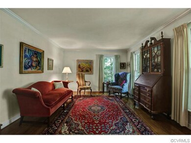 Formal Living Room with Crown Molding and Hardwood