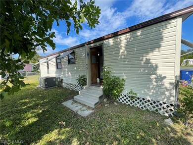Back of the home, notice the hurricane shutters.