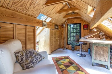 Cozy and usable attic space w/skylights
