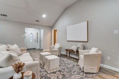 Living looking toward leaded glass front door