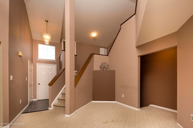 2 STORY FOYER & DINING AREA