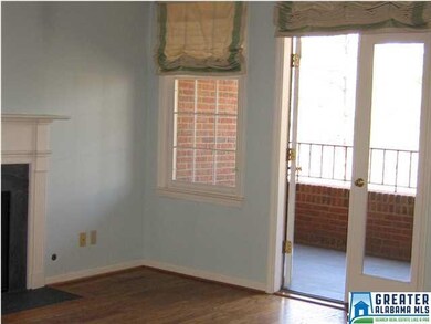 The French doors from the living room enter the op