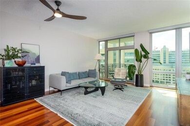 Spacious great room with floor to ceiling windows,
