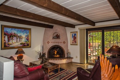 Gas burning fireplace in living room.
