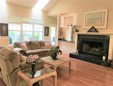 Living Room w/ wood burning fireplace