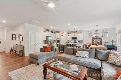 Open floor plan with luxury vinyl plank flooring throughout the entire home!