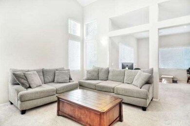 Cathedral ceilings greet you as you enter this hom
