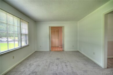 Living Room off of Foyer and Open to Dining Room!
