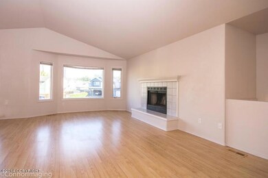 Living area with wood burning fireplace