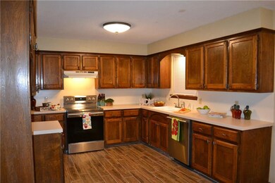 Kitchen has new stainless range and new dishwasher