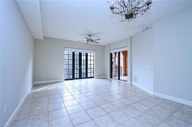 Spare room featuring ceiling fan, french doors, an