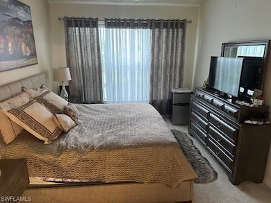 Bedroom featuring carpet