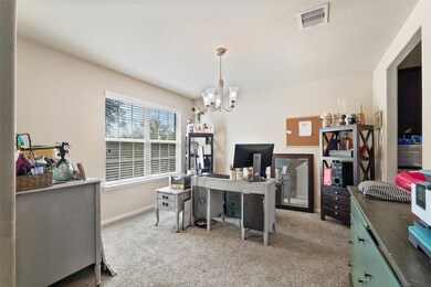 Versatile formal dining room or flex space with a