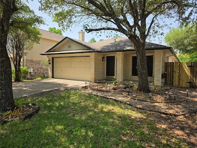 Ranch-style house featuring a chimney, an attache