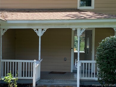 Welcoming front porch to this farmhouse charm