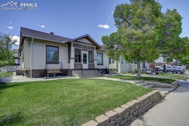 View of front of home featuring a front lawn