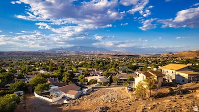 Drone / aerial view featuring a residential view and a mountain view