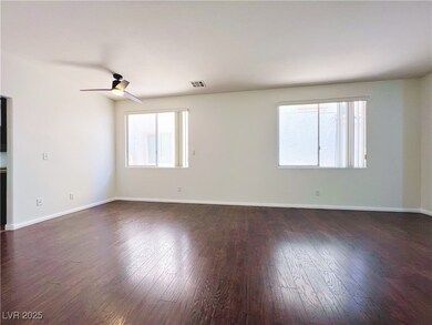 Unfurnished room with dark wood finished floors, a