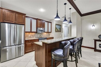 Kitchen with a kitchen breakfast bar, tasteful bac