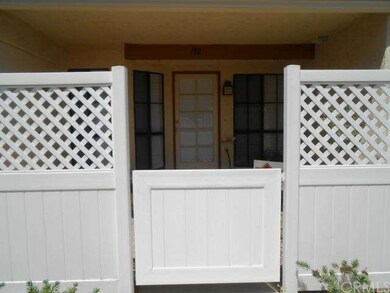 Private Courtyard Formal Entrance with Vinyl Fenci