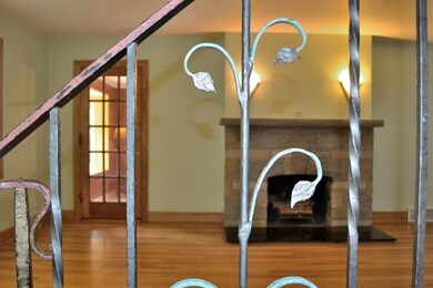 Living Room:  The beautiful multi-paned door leads
