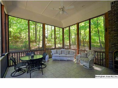Huge screened porch for relaxing at the end of the