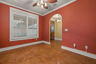 Tiled spare room with baseboards, ceiling fan wit