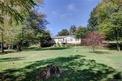 Huge front yard ready for family fun.