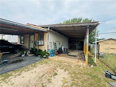 View of shed / structure featuring a carport