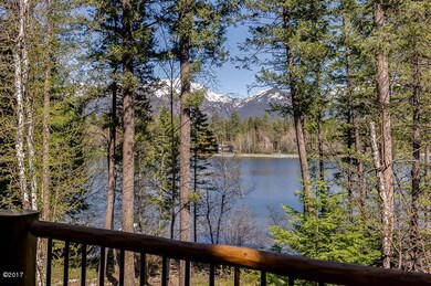 Peek of lake through the trees