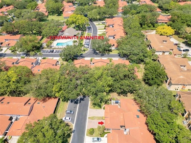 Conveniently located across the cul-de-sac from the community heated pool, club house, fitness studio and tennis courts.
