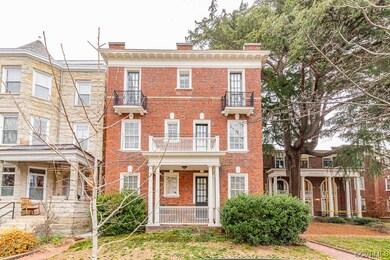 View of front of house featuring a balcony