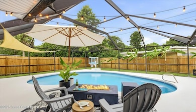 Tropical Screened Pool with TV