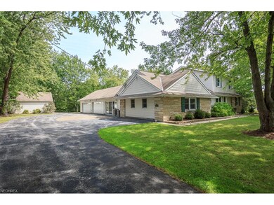 The barn on the left and 4-car attached garage off