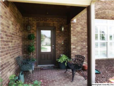 A generously-sized covered front entry...