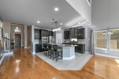 Bay window over gas stove is a nice feature!  Room