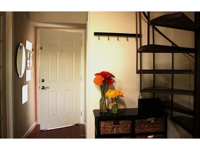 Mudroom featuring dark wood-type flooring