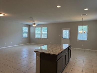 Kitchen featuring light tile patterned flooring, 