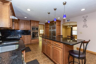 Large kitchen island with generous storage and gra