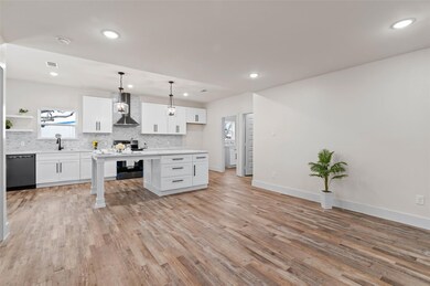 Kitchen with, dishwasher, stainless steel cooktop,